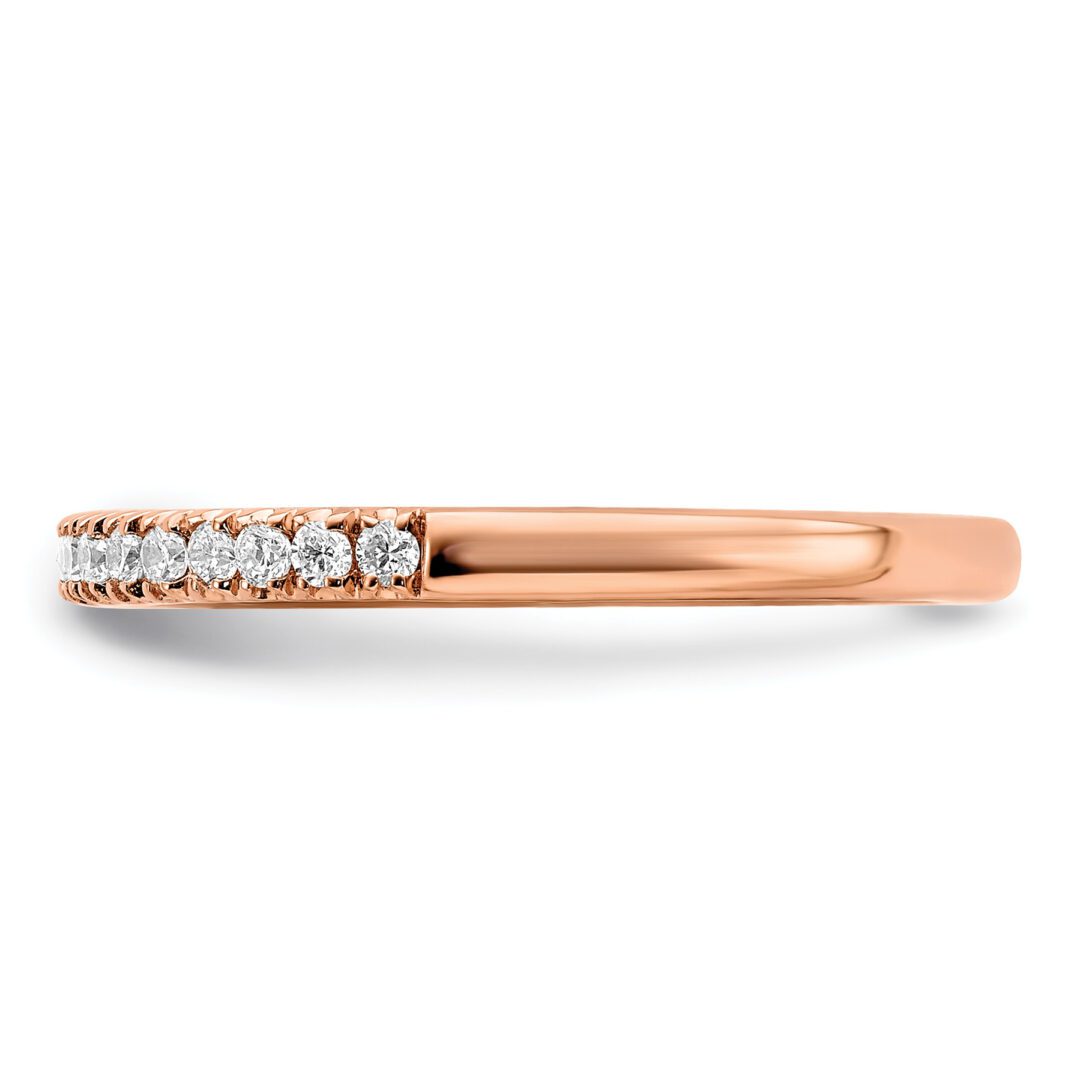 Elegant rose gold ring with small diamonds on one side.