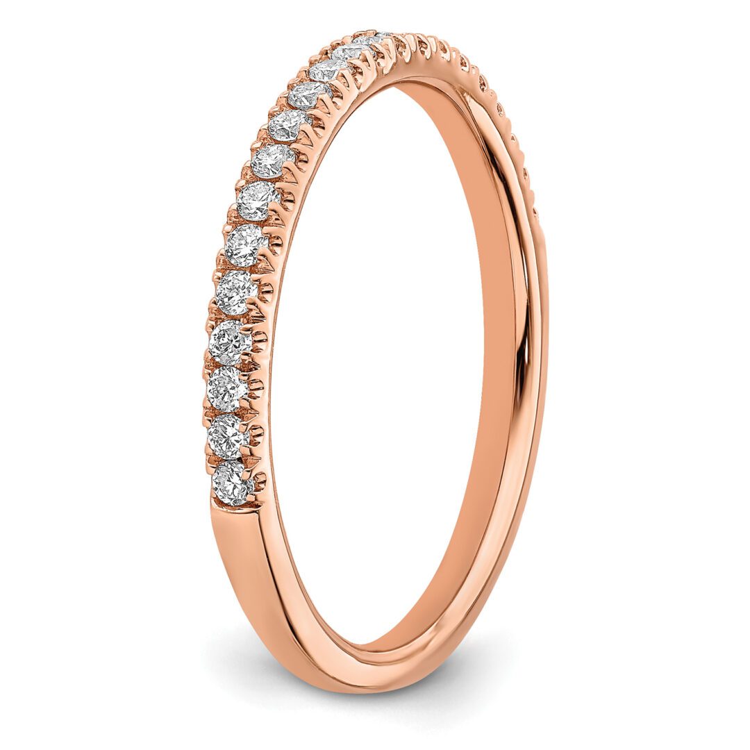 Elegant rose gold ring with a row of small diamonds.