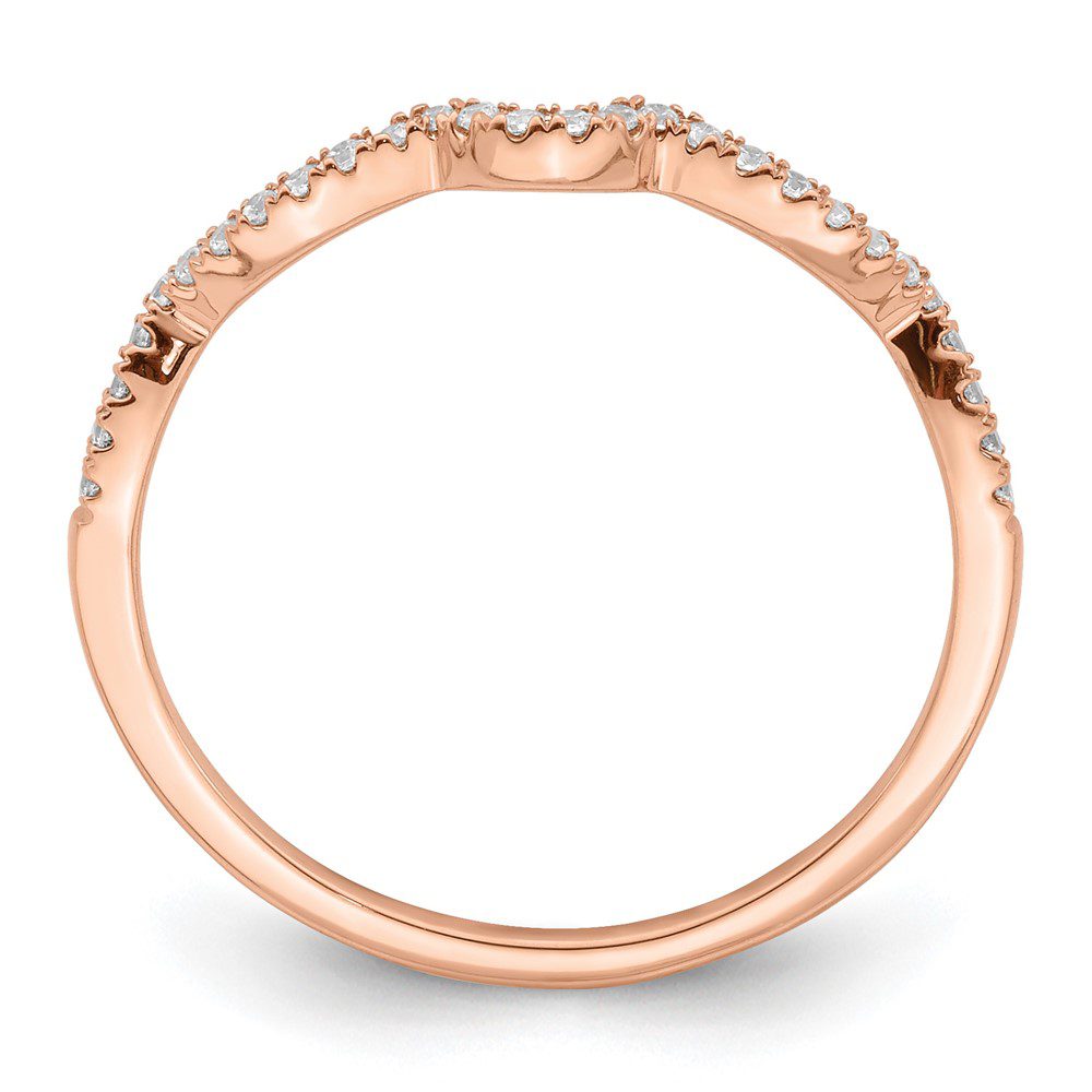 Elegant rose gold ring with small diamonds on top.