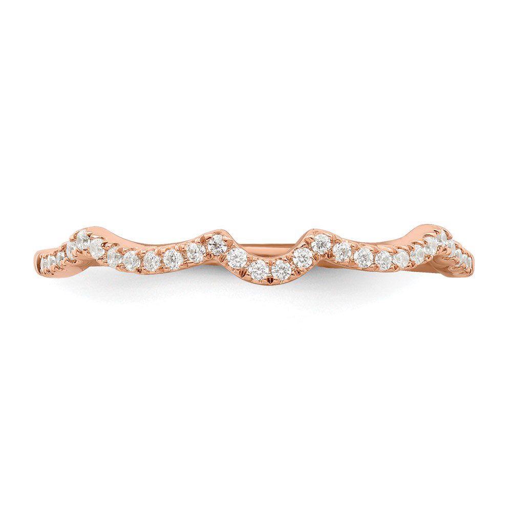 Elegant rose gold and diamond wave-shaped ring.