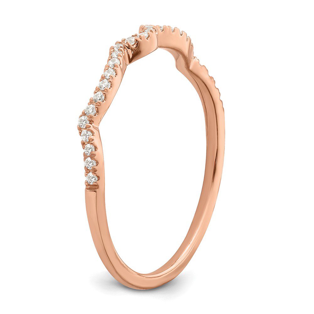 Elegant rose gold ring with small embedded diamonds.