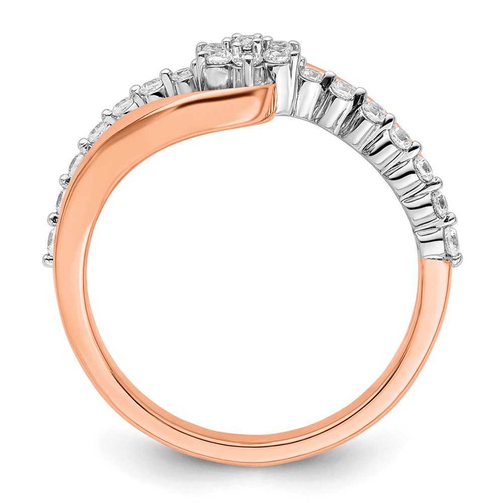 Rose gold ring with baguette and round diamonds in a stylish design.