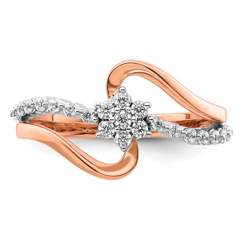 Elegant rose gold ring with a central diamond cluster and accent diamonds.