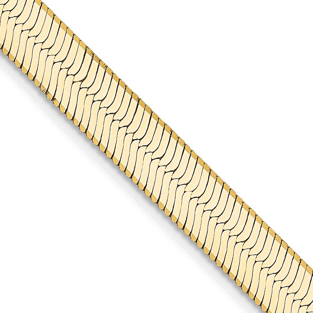 Close-up of a gold herringbone chain necklace.