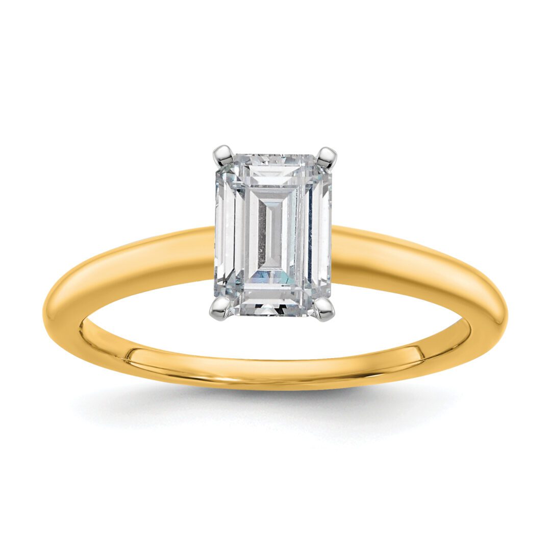 Elegant gold ring with a rectangular diamond centerpiece.