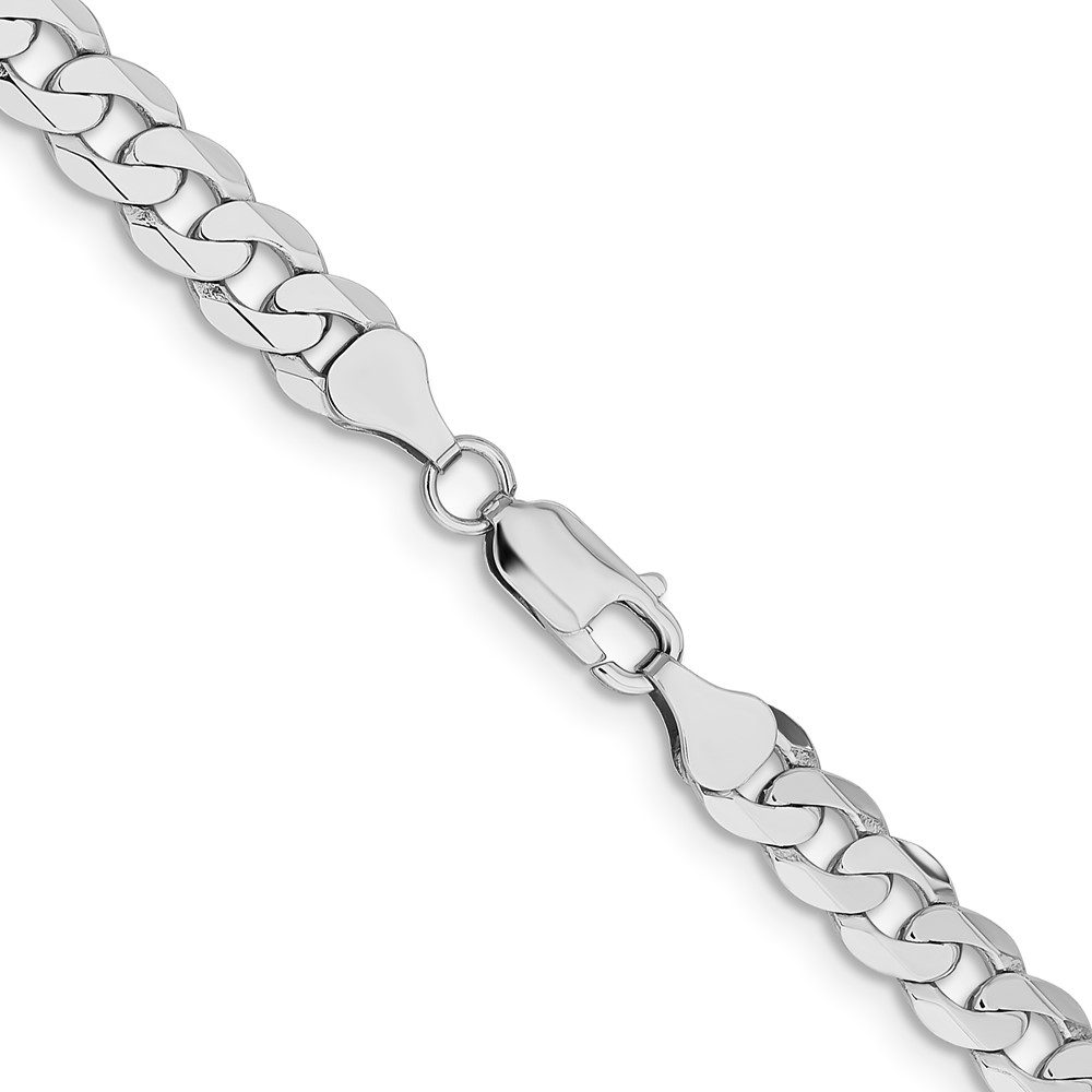 Close-up of a silver chain bracelet with a lobster clasp.