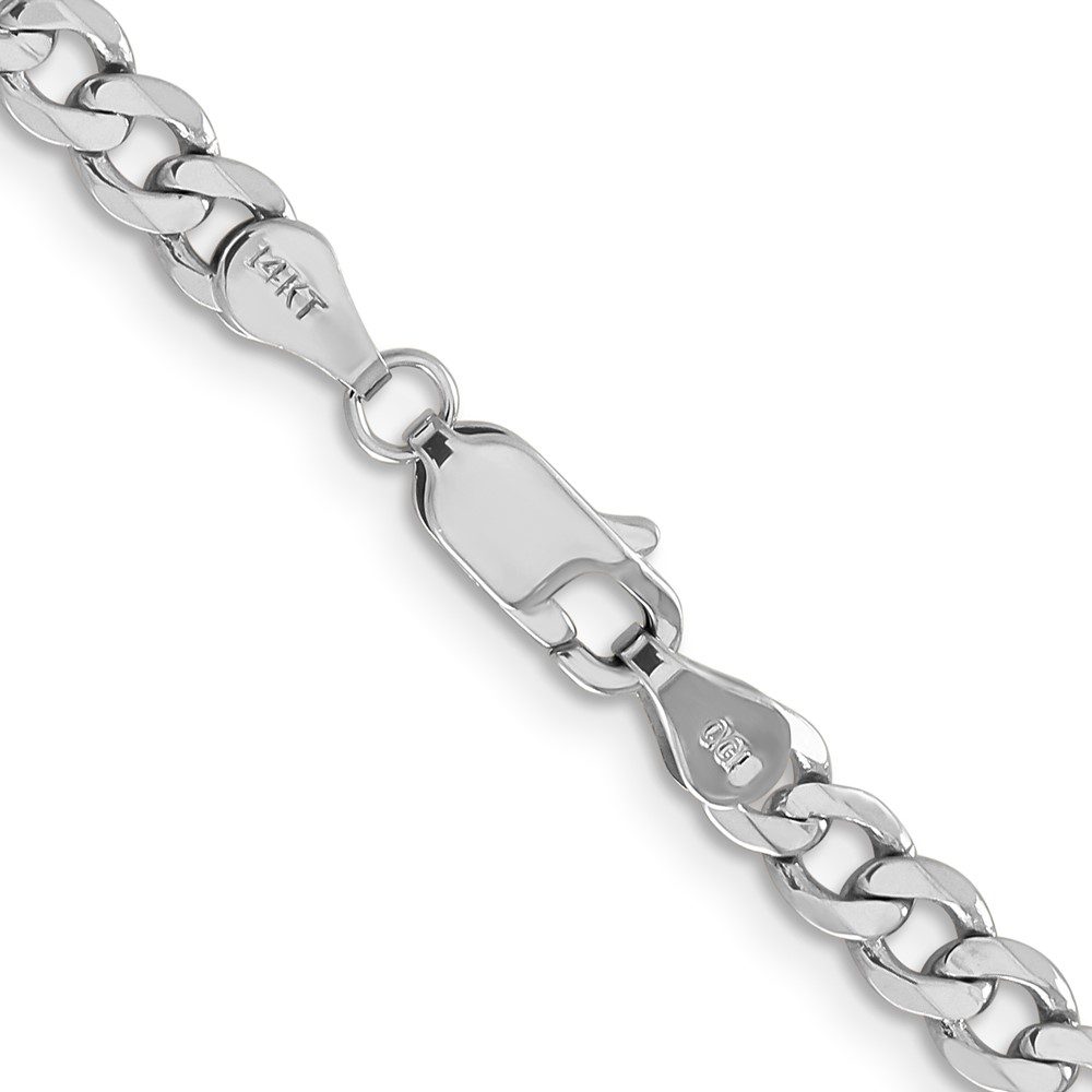 Close-up of a silver chain bracelet with polished links.