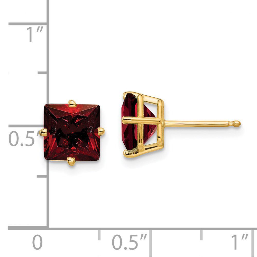 Square garnet stud earrings with gold settings.
