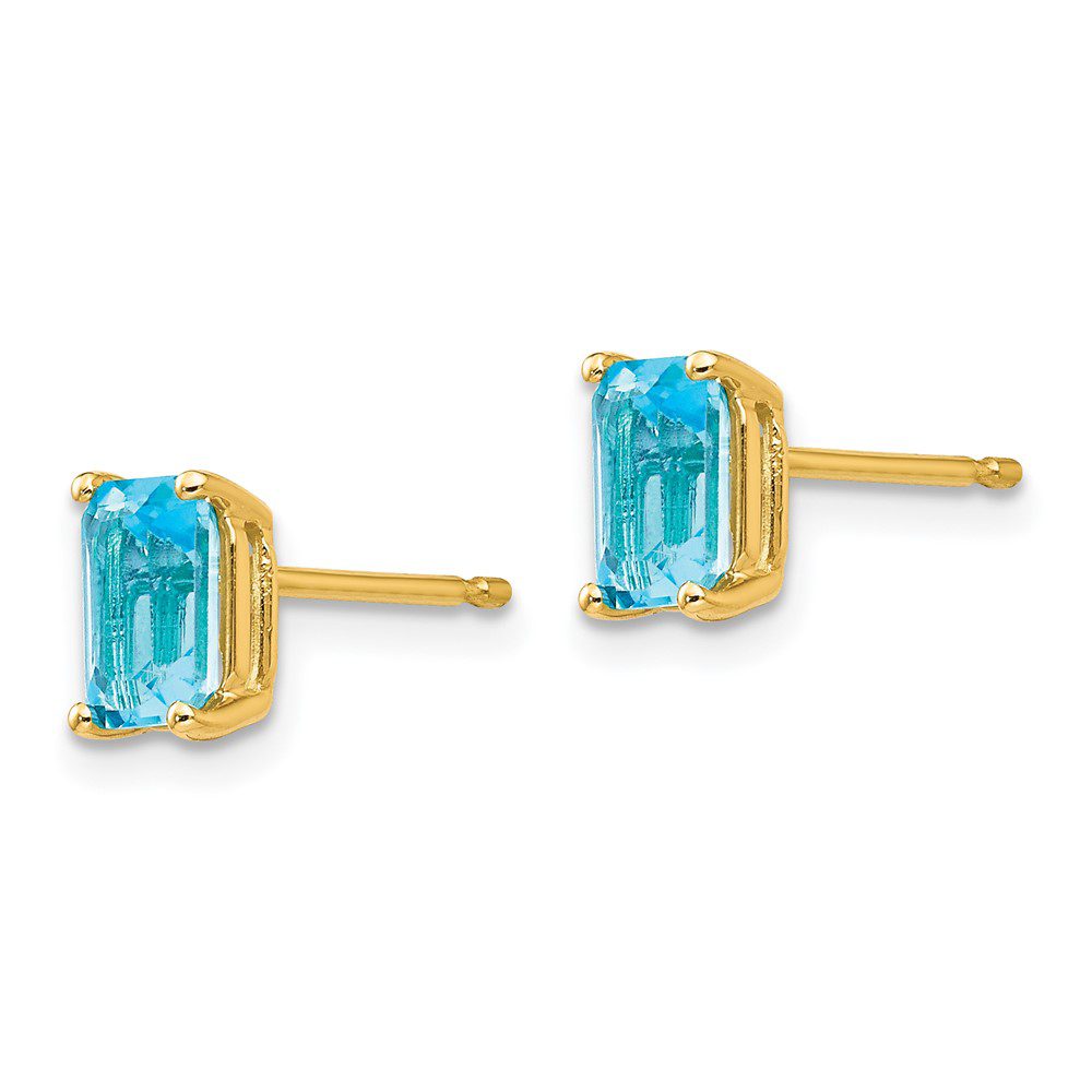 Elegant gold earrings with rectangular blue gemstones.