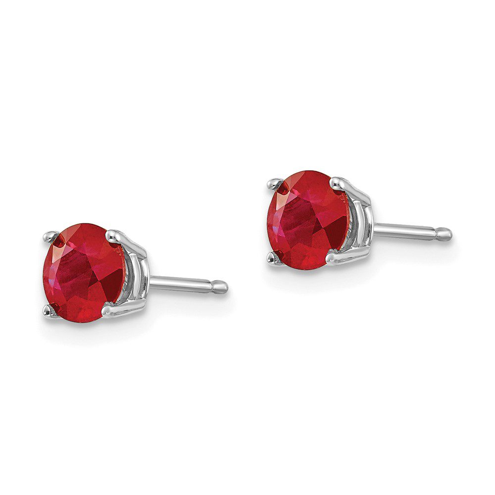 Pair of elegant red gemstone stud earrings with silver posts.