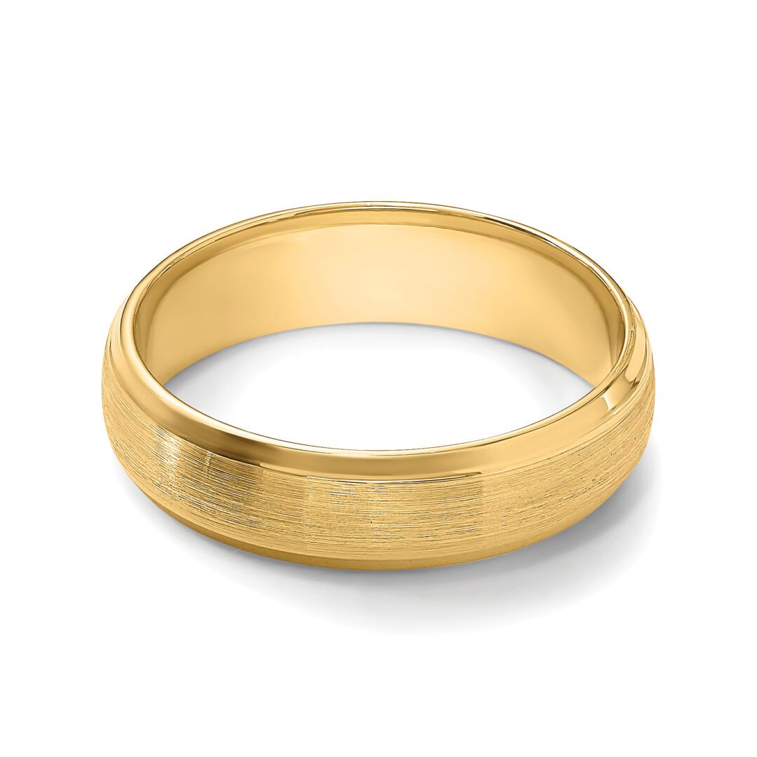 A simple gold wedding band with a smooth finish.